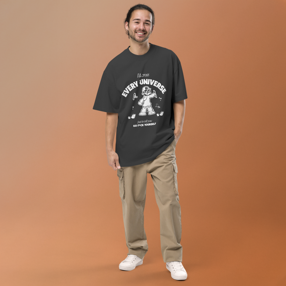 Man wearing a black t-shirt with graphic design on an orange background