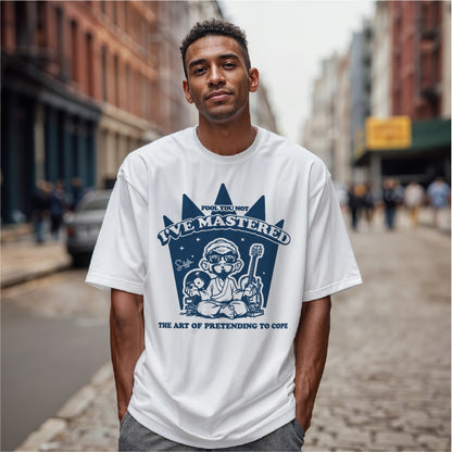 Man wearing a white t-shirt with a graphic design on a city street