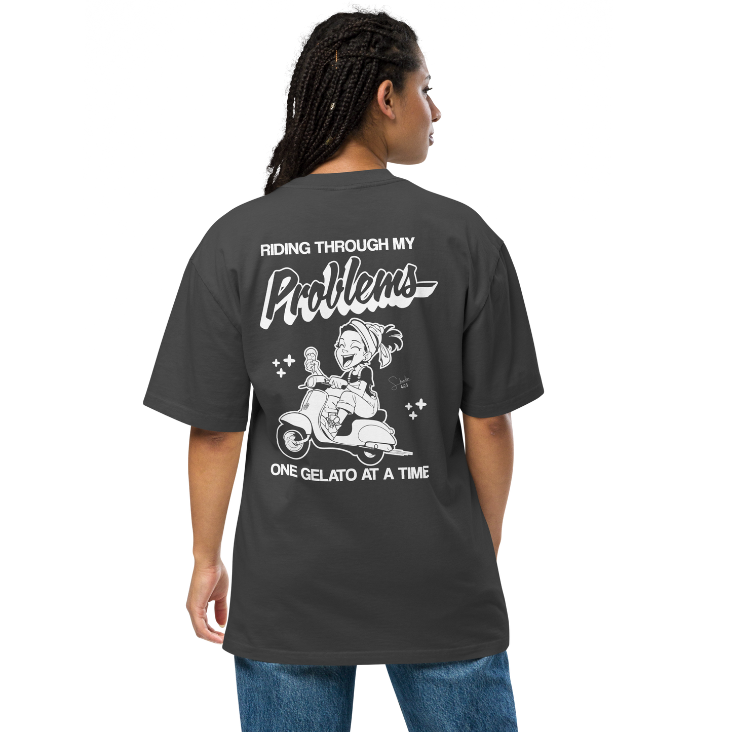 Person wearing a black t-shirt with a graphic design and text on the back, on a white background